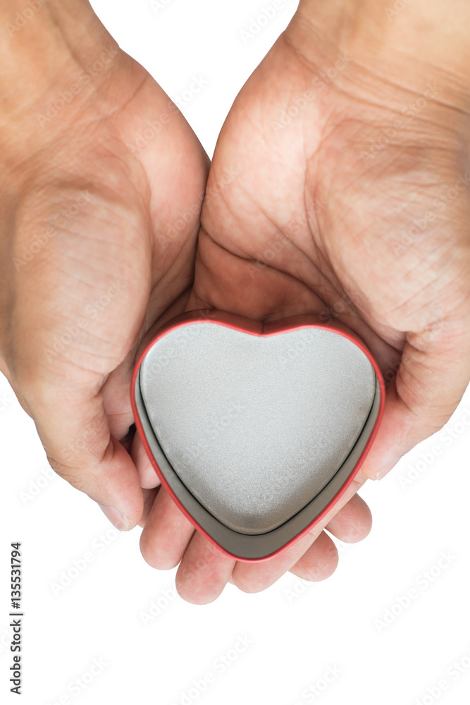 Obraz premium Empty heart shape tin can in man hands