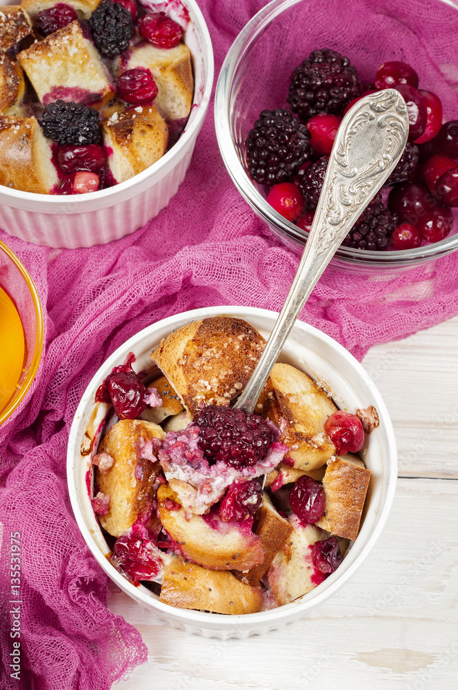 French toast casserole with cranberries, raspberries and blackbe