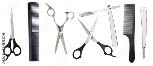 Comb with scissors and razor on a white background