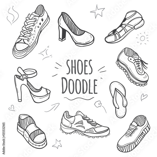 Boots doodle collection. Set of doodle shoes with sneakers, loafers, flip flops and sandals.Vector black and white illustration. © fleren