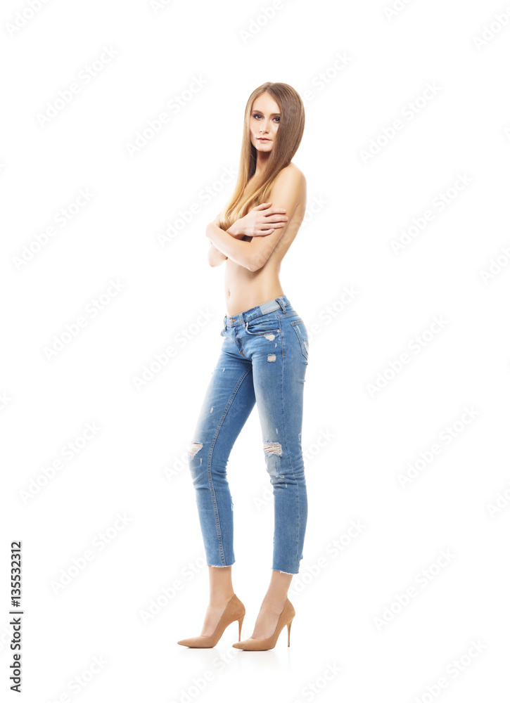Beautiful and sexy woman in stylish jeans isolated on a white ba