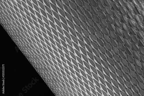 mesh metal for filter in roll on a black background photo