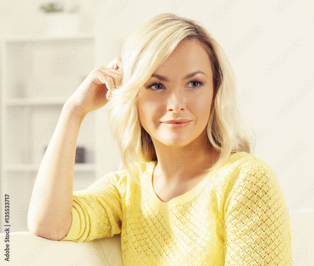 Attractive happy girl relaxing at home. Attractive happy girl relaxing at home.