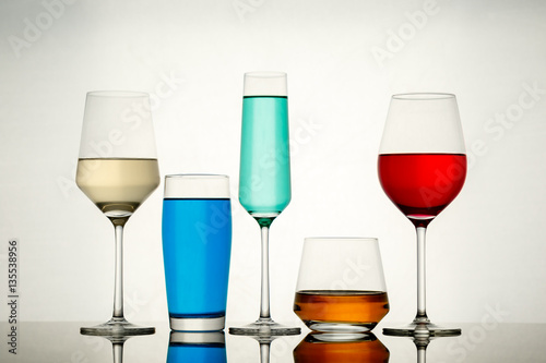 drinks in various alcoholic glasses