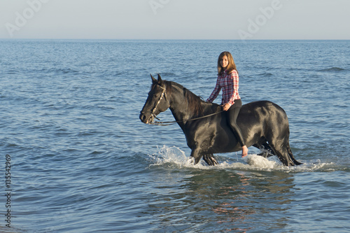 horse woman in the sea