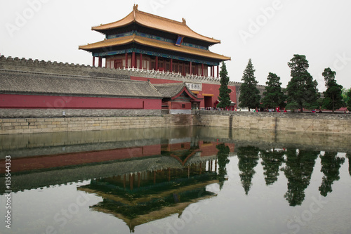 Photo of Old Buddhism Temple. Red Asian Pagoda Tower. Ancient Architecture Asian Temple