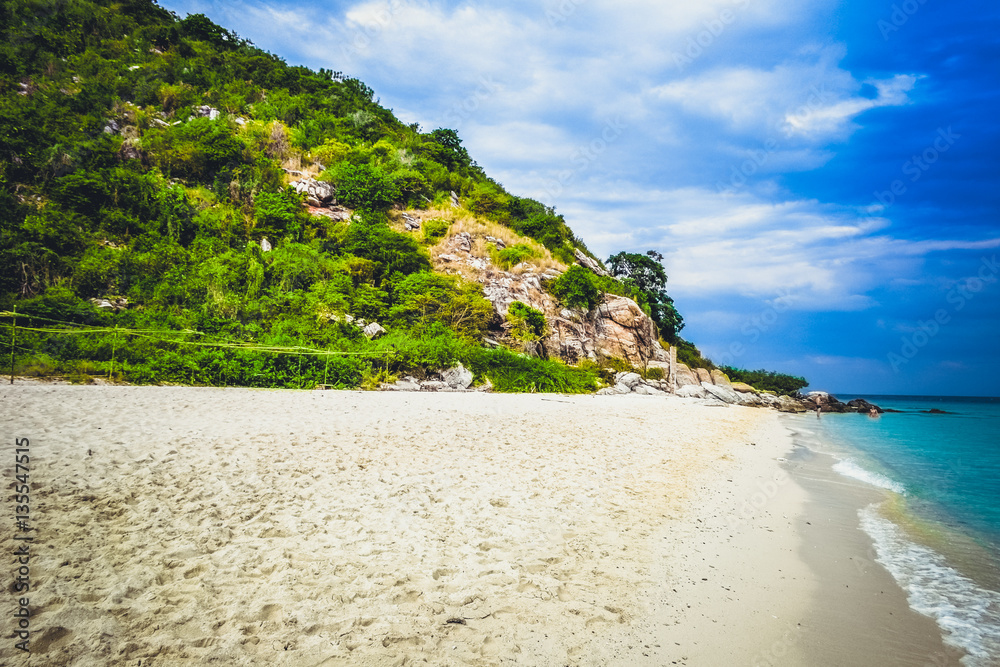 The white sand on the beach of the Koh Rin island near the Pattaya, Thailand