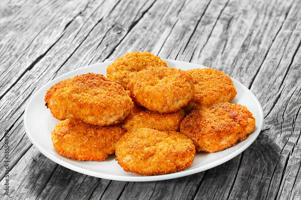 Close-up of juicy delicious breaded chicken cutlets