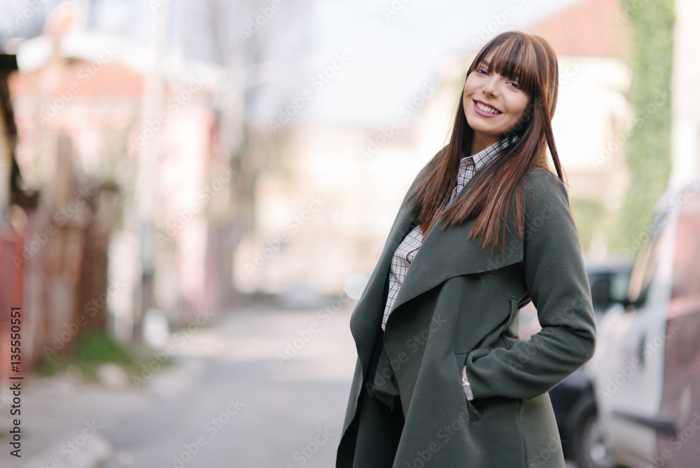 Beautiful Young Professional posing outside