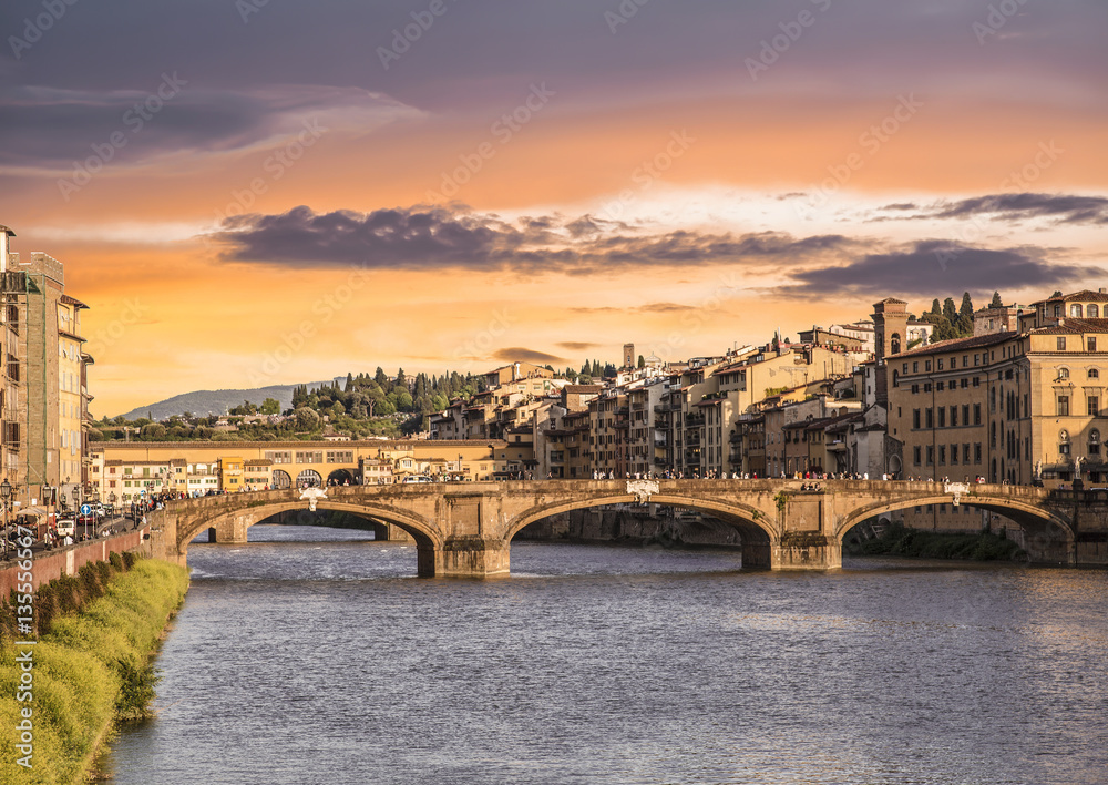 The Ponte Vecchio bridge in Florence at sunset, Italy