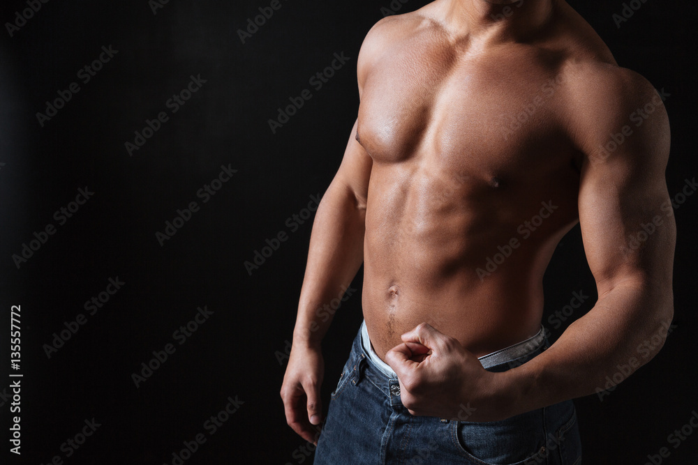 Cropped photo of handsome young african sportsman posing Cropped photo of handsome young african sportsman posing