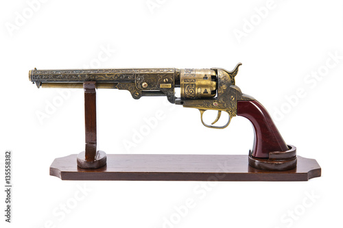 Antique gun on white background photo