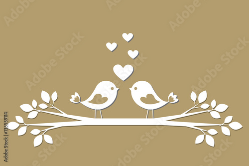 Cute birds with hearts cutting from paper