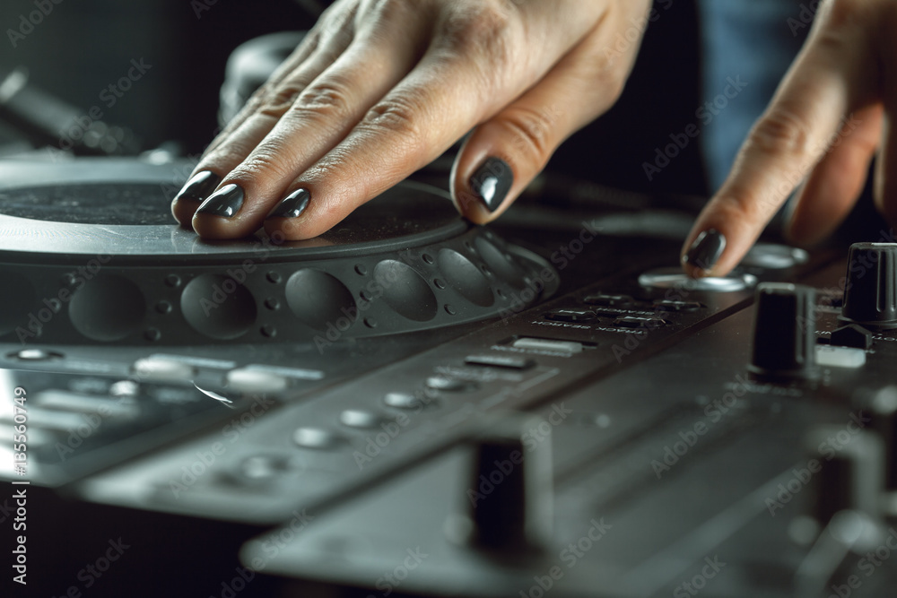 DJ playing music at mixer closeup DJ playing music at mixer closeup