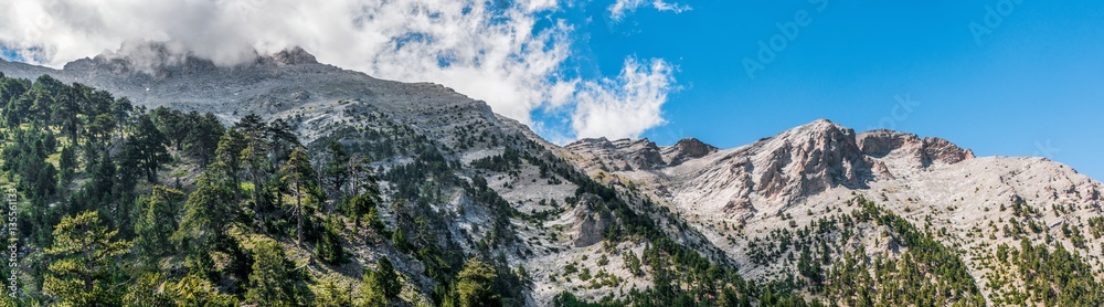 Panorama of mountain Olympus high peaks at summer in Greece as seen from refuge A Panorama of mountain Olympus high peaks at summer in Greece as seen from refuge A