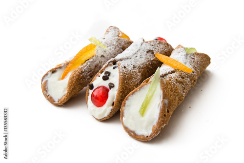 Sicilian cannoli, italian dessert with ricotta cheese, chocolate chips and candied fruit  photo