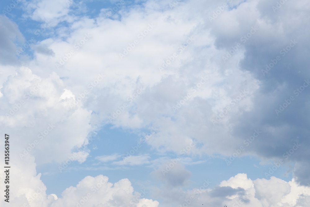 blue sky with big white cloud, and raincloud in nature blue sky with big white cloud, and raincloud in nature