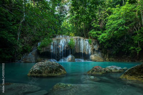 Fototapeta Naklejka Na Ścianę i Meble -  Breathtaking green waterfall, Erawan's waterfall, Located Kanchanaburi Province, Thailand
