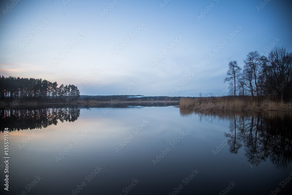 A beautiful norther Europe landscape with a lake in early spring