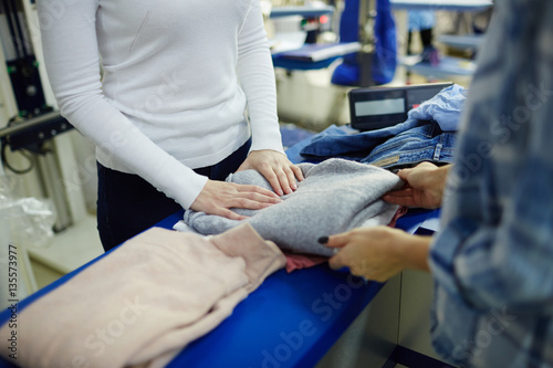 Fotografía Taking pullover from dry-cleaning
