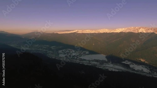 Wallpaper Mural Aerial view of sunset over mountain city
 Torontodigital.ca