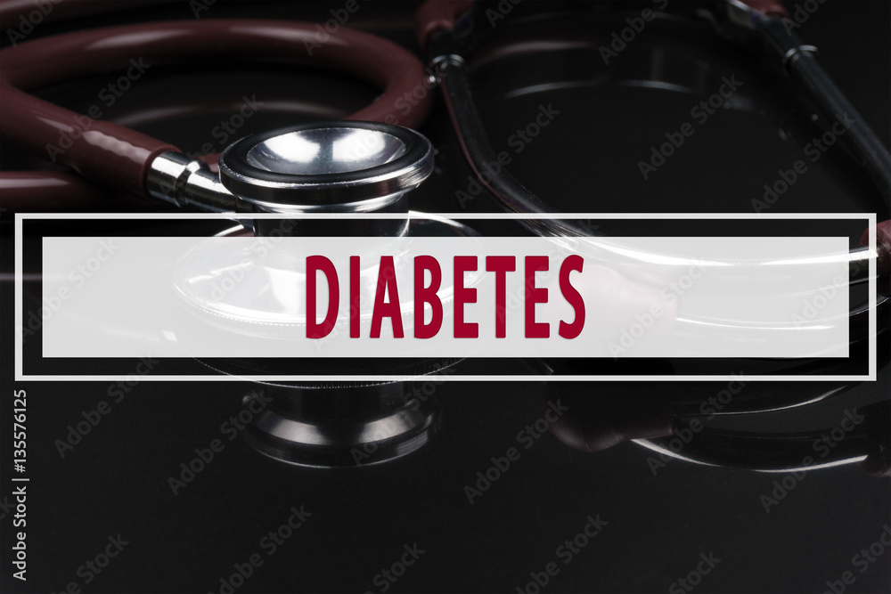 Obraz premium Stethoscope on black background with text DIABETES