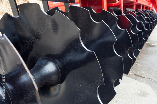 Agricultural equipment for fields. Plow close up. photo