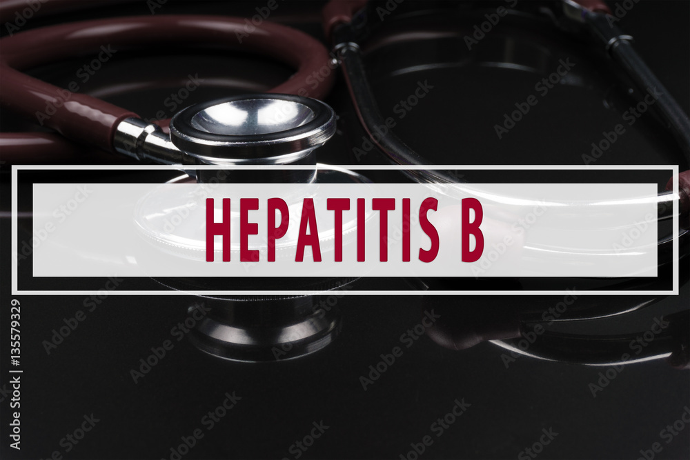 Obraz premium Stethoscope on black background with text HEPATITIS B