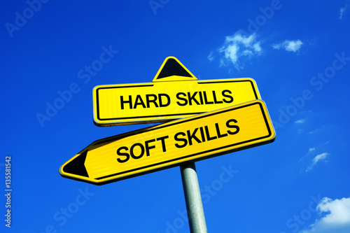 Hard Skills vs Soft Skills - Traffic sign with two options - dilemma between abilities and capabilities. Technical and practical knowledge vs social and emotional interaction and skillfulness