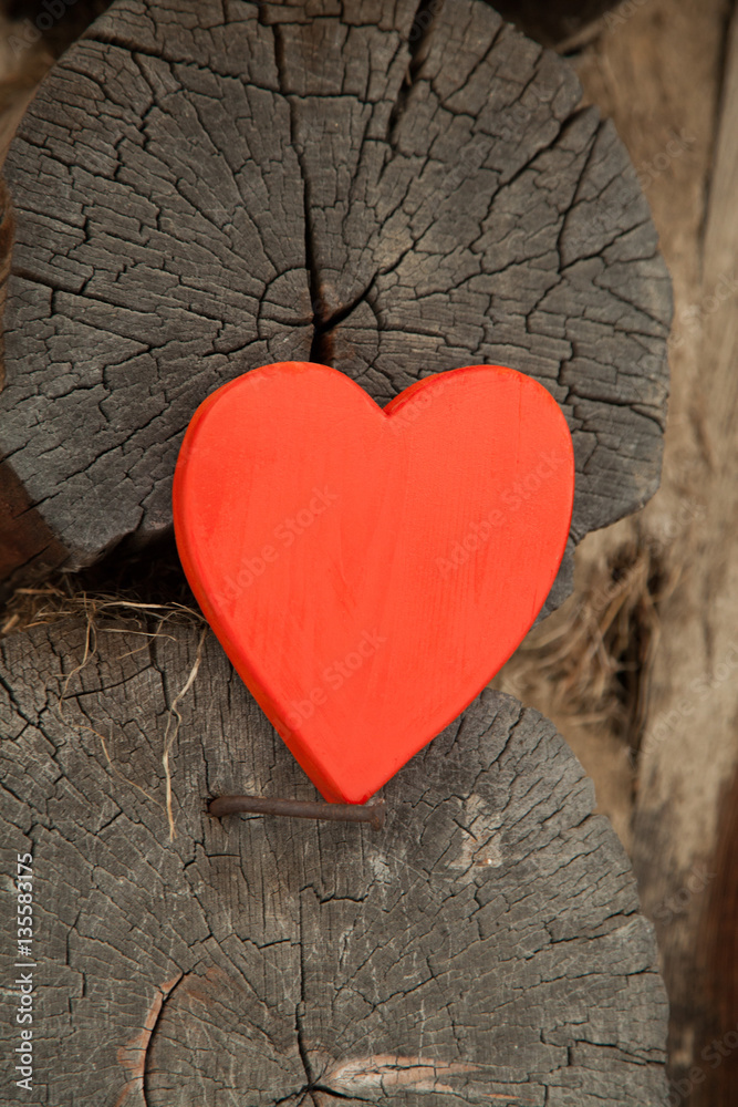 Red heart on a rustic wooden background. St. Valentine's Day Red heart on a rustic wooden background. St. Valentine's Day