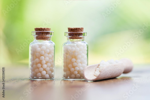 Fototapeta Naklejka Na Ścianę i Meble -  Homeopathy - A homeopathy concept with homeopathic medicine