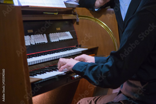 Playing organ in the church