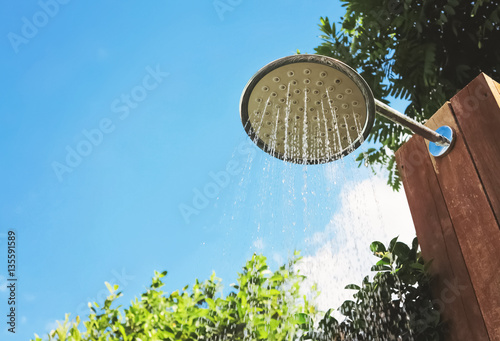 outdoor rain shower and blue sky