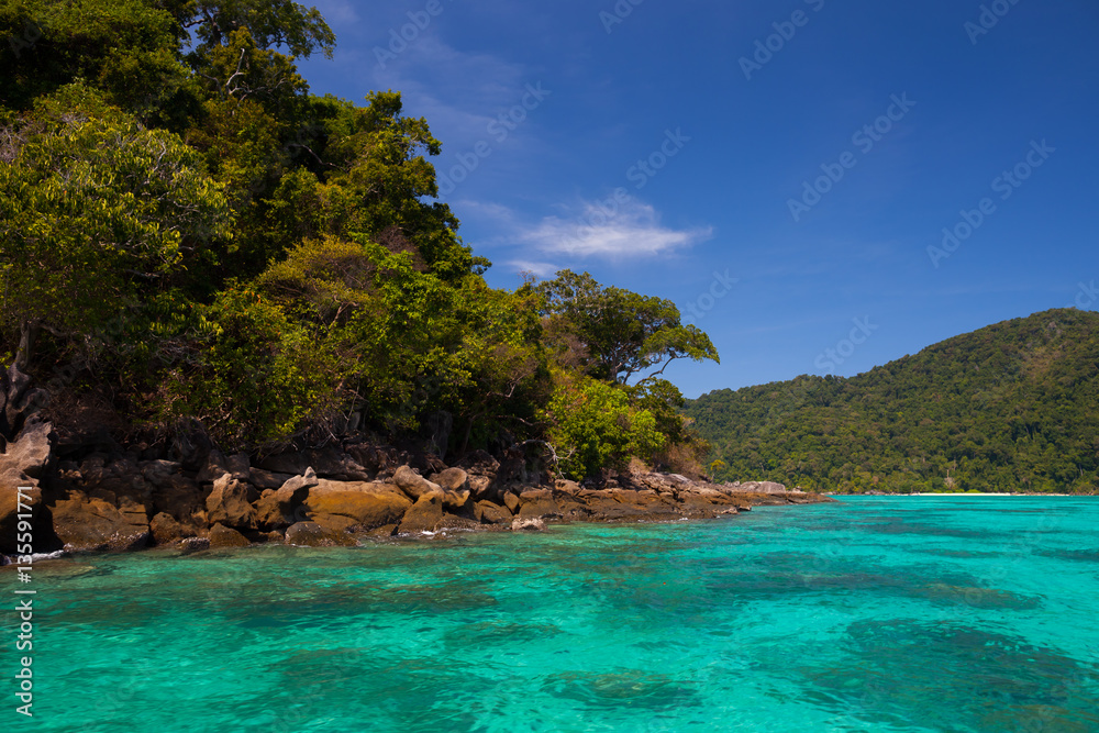 A clear water of beautiful ocean in Tropicana with blue sky located south of thailand