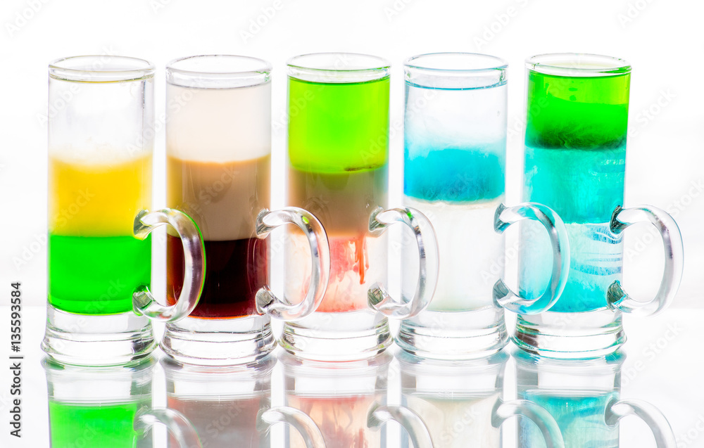 shots of colored layers of different alcohol shots of colored layers of different alcohol