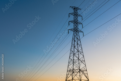 high voltage post.High-voltage tower sunset background.