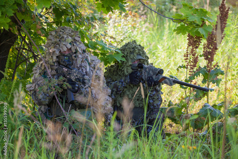 military men in an ambush in the forest military men in an ambush in the forest