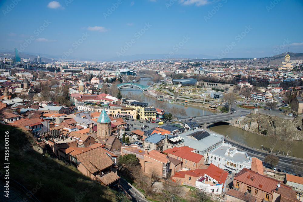 TBILISI, GEORGIA - MARCH 5, 2016: Top view of the river and the Church in the central part of the city.