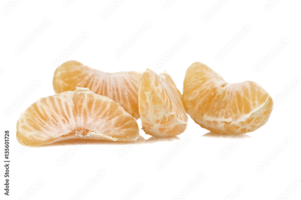 Mandarin or Tangerine fruit with leaves on a white background