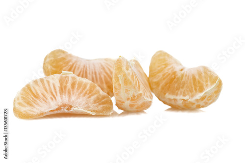 Mandarin or Tangerine fruit with leaves on a white background