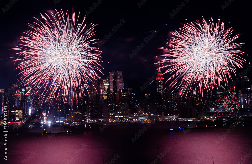 Celebrate Chinese New Year Fireworks In Hudson River New York with Empire State Building as background at night Celebrate Chinese New Year Fireworks In Hudson River New York with Empire State Building as background at night