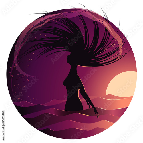Woman silhouette in sunset flipping her hair