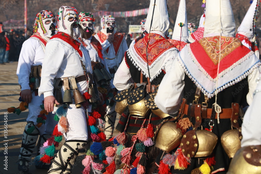Pernik, Bulgaria - January 28, 2017: Masquerade festival Surva in Pernik, Bulgaria. People with mask called Kukeri dance and perform to scare the evil spirits.