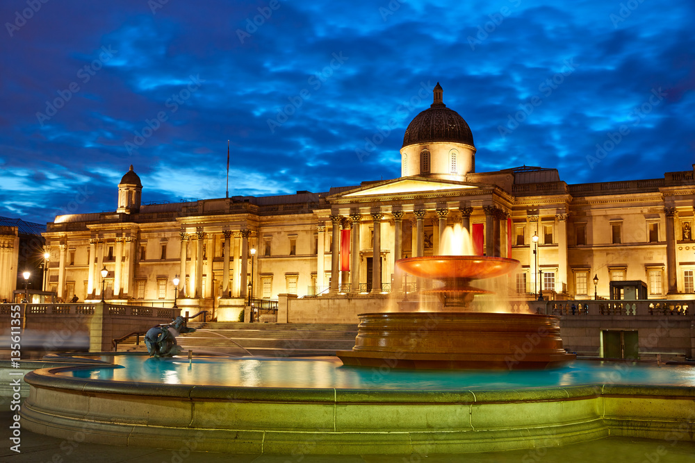 London Trafalgar Square fountain at sunset