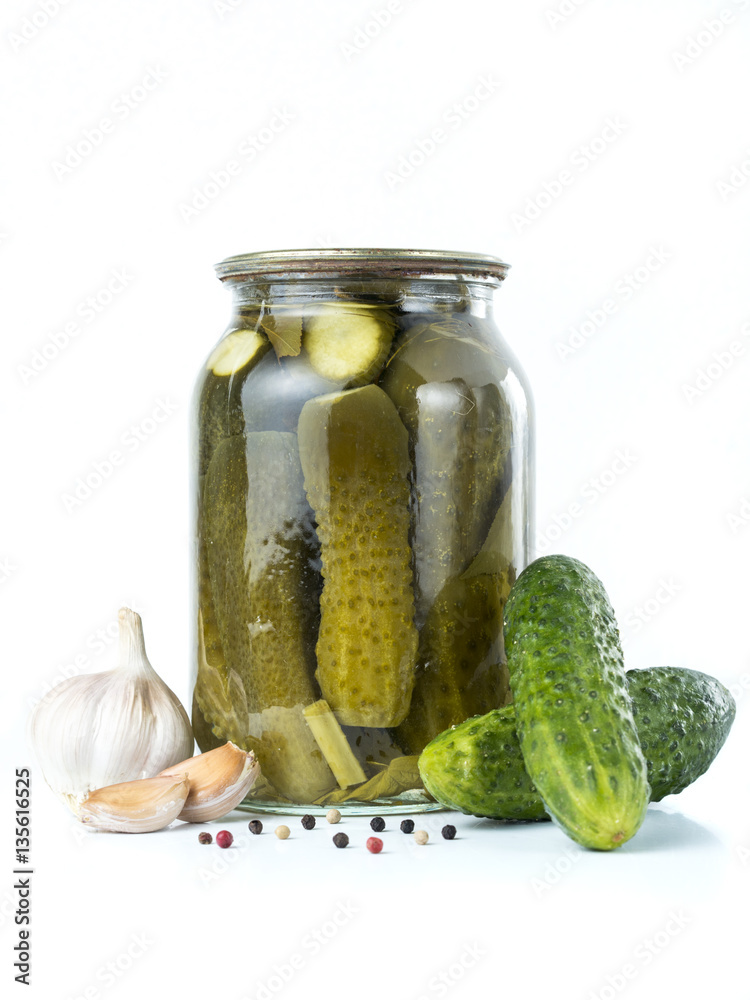 Pickles in glass jar isolated on white Pickles in glass jar isolated on white