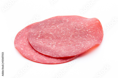 Salami smoked sausage one slice isolated on white background cut