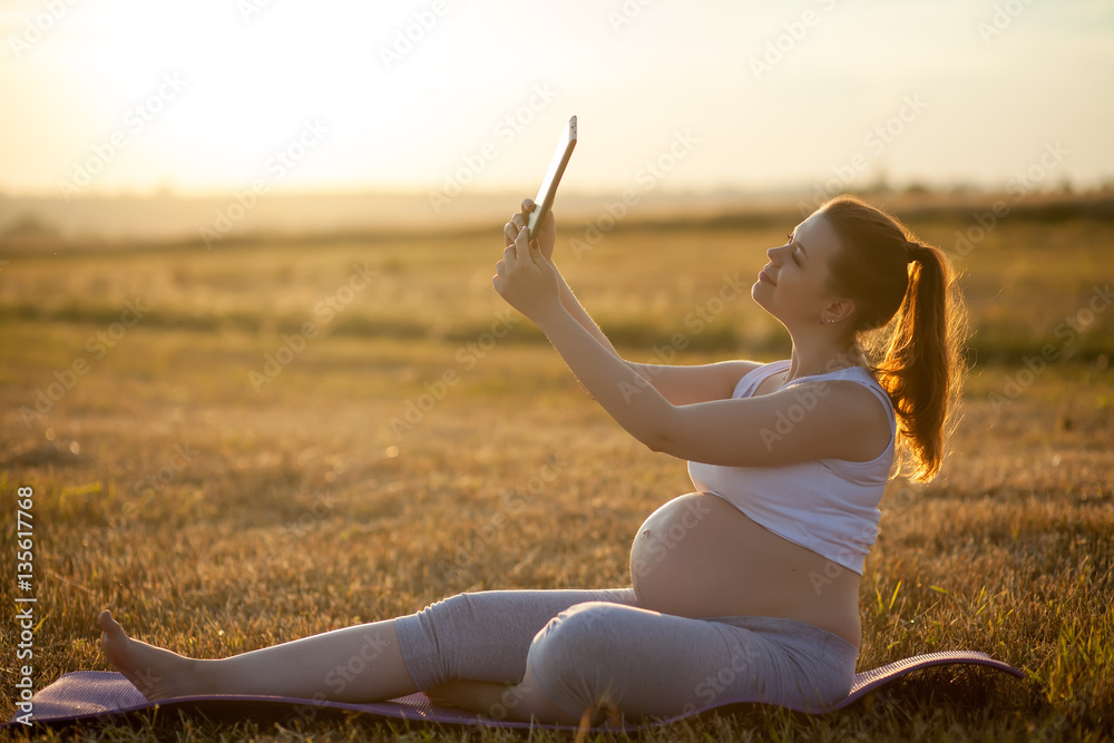 9 Months Pregnant Woman Doing Selfie On The Tablet Outdoor Pregnancy