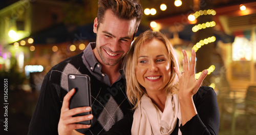 Photography Millennial girlfriend taking selfies with her new engagement ring