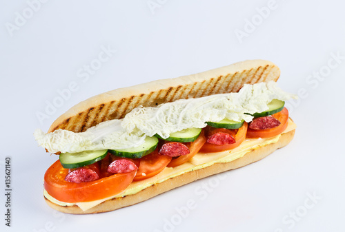 Papini with sausage on a white background. photo