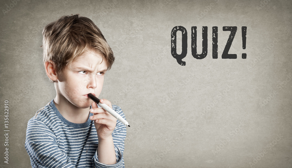 Boy with Quiz text on grunge background